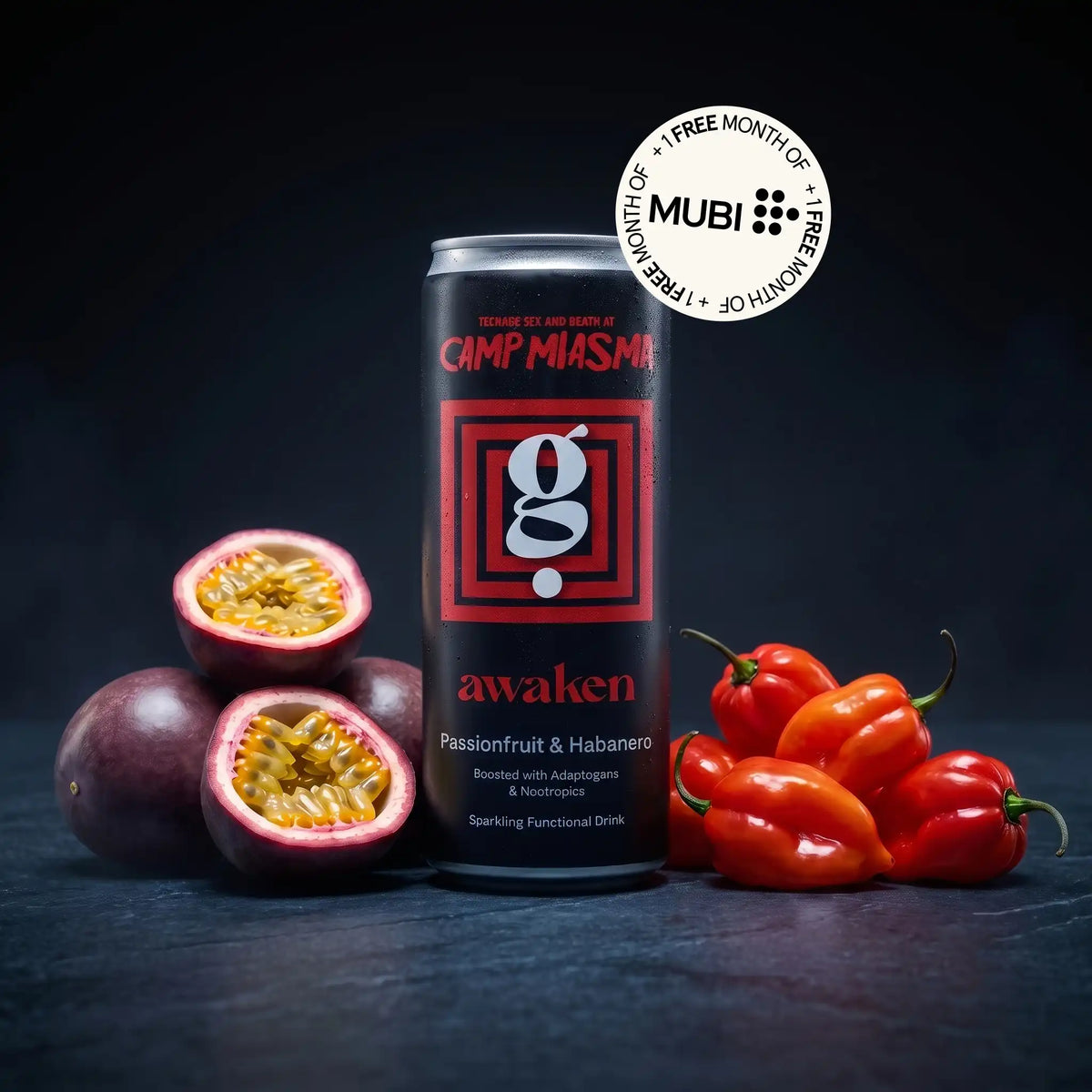 A black can of Camp Marnia 'awaken' passionfruit and habanero sparkling functional drink, styled with whole and halved purple passionfruit and red habanero peppers on a dark surface against a dark background, with a Mubi 'Free Month' badge overlay.